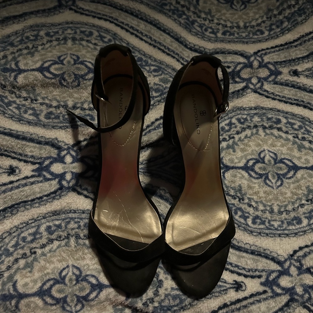 Women’s size: 8.5 black heels